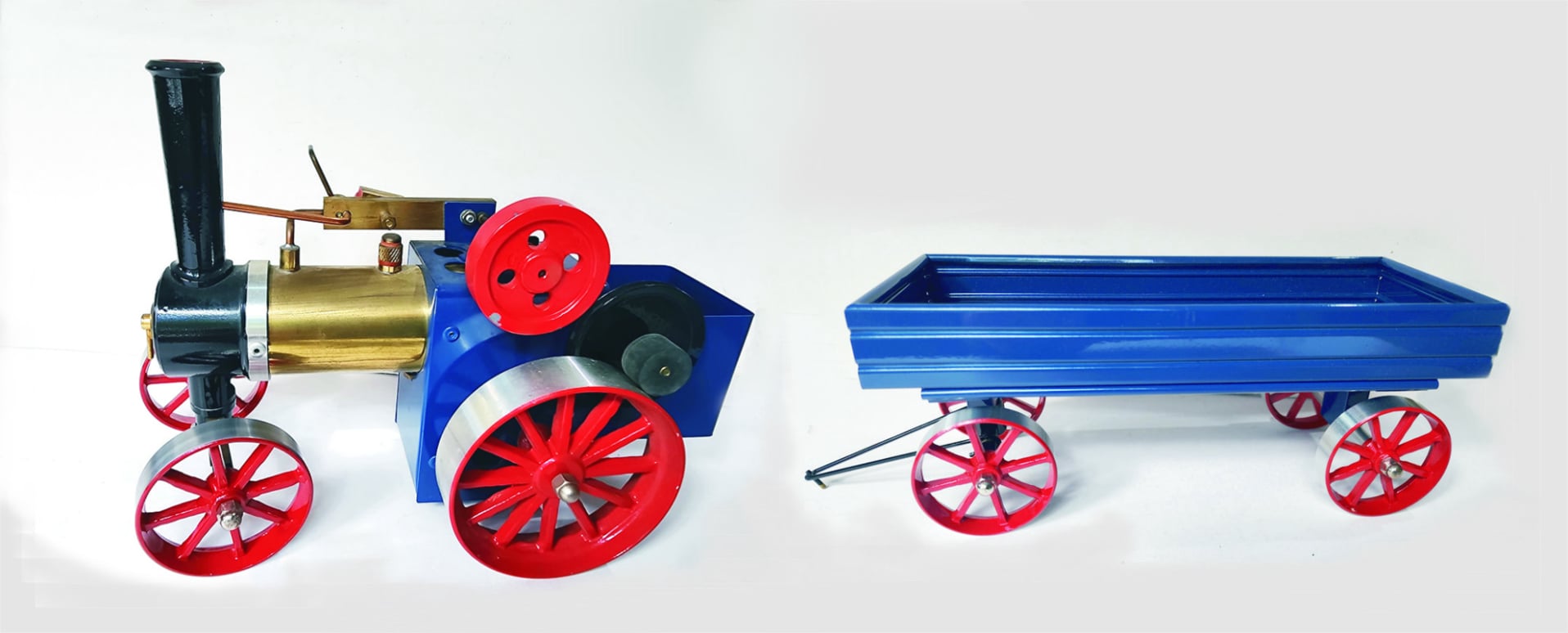 David Auld traction engine with cast wheels and a matching cart